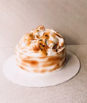 Passionfruit Cloud Cake | Vanilla Chiffon Cake With Passionfruit Cream, Covered In Toasted Meringue | 7 Inches in Diameter